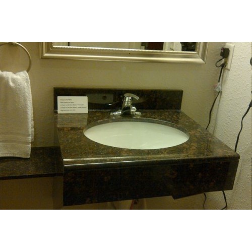 Brown Vanity with Round Sink